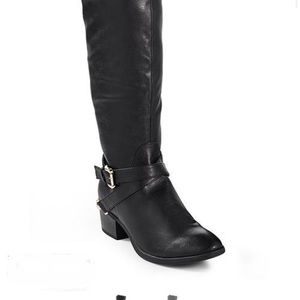 Over the knee black boots.